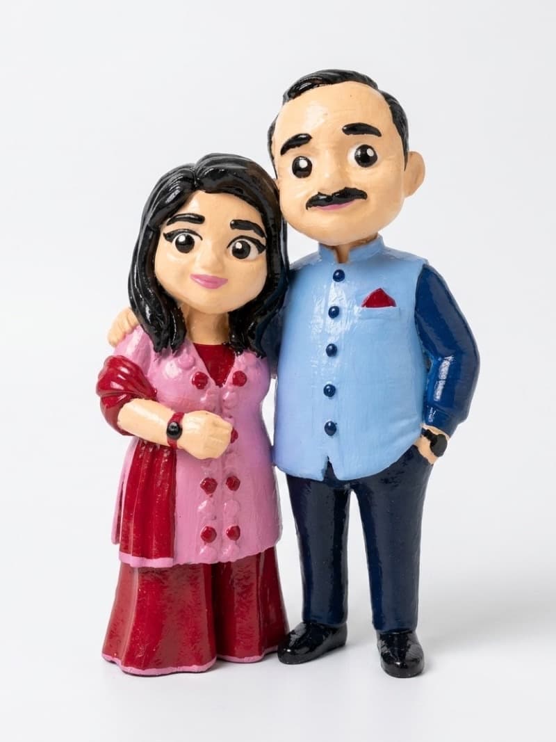 Hand-painted custom figurine — mum and dad, in miniature